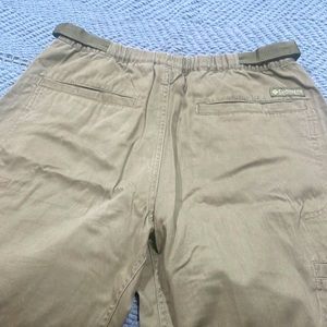 Columbia khakis with elastic waist incorporated belt.